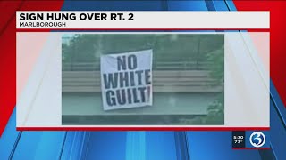 VIDEO: 'No white guilt' sign hung over Route 2 upsets drivers