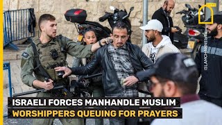 Israeli forces manhandle Muslims waiting at checkpoint for Friday prayers at Al-Aqsa compound