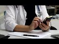 Female Doctor Working In Office Stock Video