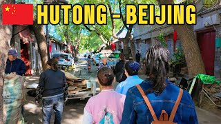 Exploring Hutong: A Walk through Beijing's Ancient Alleyways and visit a local family