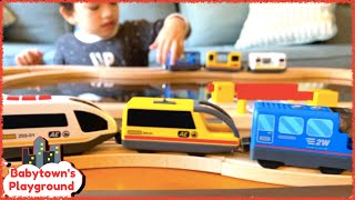 Cute kid Pretend Play with Toy Trains