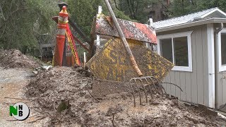 Forestville Slide Threatens Homes