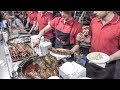 Poland Street Food. Huge Sausages, Ribs, Skewers and more Meat on Grill. Italy Fair