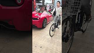 Ferrari cruising through Asakusa with an influencer. Note, all the cameras.