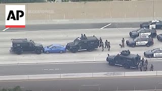 WATCH: Standoff between police and suspect on California freeway