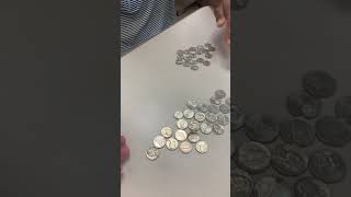 How many nickels equals one dollar? 3