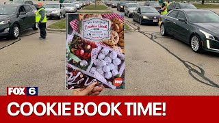 We Energies Cookie Books distributed | FOX6 News Milwaukee