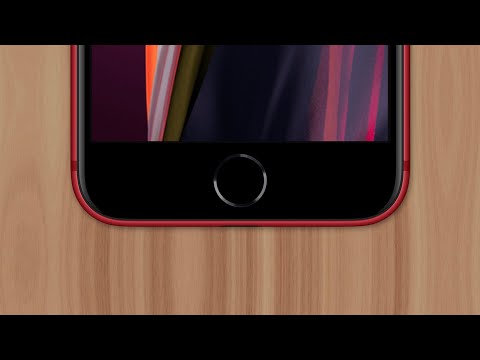 What happens when you hold the Home button on iPhone?