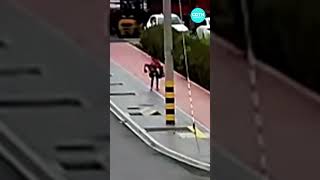 Chinese couple saves two-year-old boy riding toy car in traffic