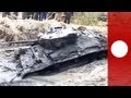 Rare WWII tank emerges from mud in Poland