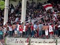 la hinchada lujanense en el partido con