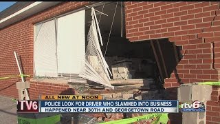 Police look for driver who ran into business