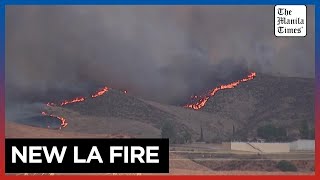 New wildfire near Los Angeles explodes to 8,000 acres, forces evacuations