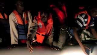 MOAS rescues migrants from dinghy at night