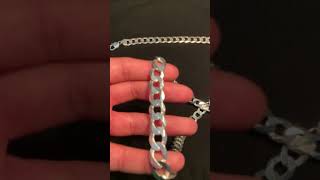 Showcasing silver Cuban Link Chain and Bracelet