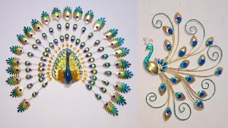 2 bellos adornos de pavo real. 2 beautiful peacock ornaments.