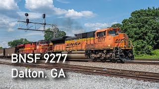 BNSF 9277 and Norfolk Southern 8114 leading south past the Dalton Freight Depot in Dalton, GA.