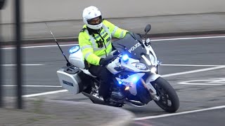 Two Metropolitan Police SEG (Special Escort Group), BMW bikes responding through Lambeth.