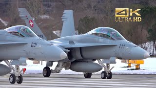 2 McDonnell Douglas F-18 Hornet Swiss Air Force J-5001 J-5233 departure at Meiringen Air Base LSMM