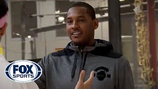 Carmelo Anthony plays basketball as President Obama