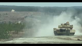 M1 Abrams Tank firing round at target practice - Military Army / Marines