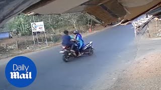Horrifying moment a speeding motorbike crashes into scooter