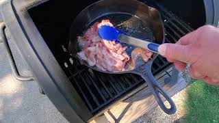 Griswald skillet 1928 model cooking bacon on the grill!