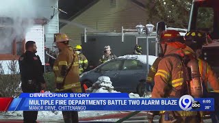 Multiple fire departments battle two alarm blaze