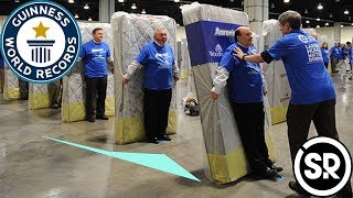 Largest human mattress dominoes - Guinness World Records|ගිනස් ලෝක වාර්තාව