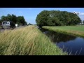 Auto belandt in het water door aanrijding op N758 Zwolle - Nieuwleusen