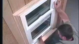 Atrium Vinyl Window Installation in a Wood Window Opening