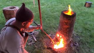 Iron smelting in the early medieval slag drop shaft furnace, making iron