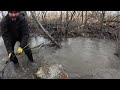 “unclogging culvert discharge ditch blocked by beavers”