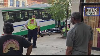 Several hospitalized after city bus crashes, lands on top of car in downtown Macon