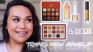 TRYING NEW MAKEUP | CHARLOTTE TILBURY, NATASHA DENONA, PAT MCGRATH, VISEART \u0026 MORE