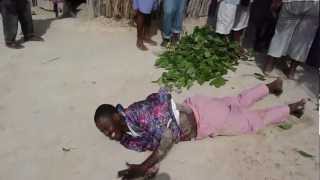 Voodoo Priest Turns into Snake in Haiti