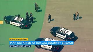 Man detained after scaling fence at LAX, approaching Delta plane | ABC7