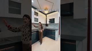 Lavish 3BHK flat featuring a sleek open modular kitchen for modern living Call 𝐨𝐧 - 𝟖𝟒𝟒𝟖𝟗𝟕𝟗𝟐𝟏𝟐