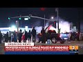 arizona anti ice protester breaks police vehicle windshield