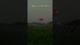 Oversized heavy-duty agricultural drone spraying at night