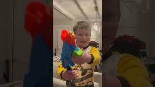 Eli tests Nerf guns on himself