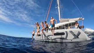 Jumping from the Island Jewel Catamaran