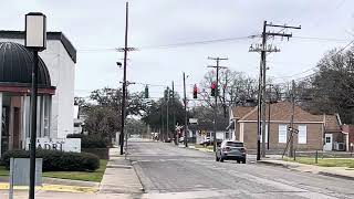 WB BNSF OSC Super Bowl Train rolling into downtown New Iberia. Love when we get these old cars.