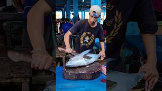 Amazing! This young man shows off his tuna cutting and skin removing skills #fish #skills #food