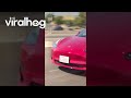 Car Drives With Sun Shield Up On California Freeway || ViralHog