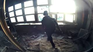 Climbing through an abandoned factory