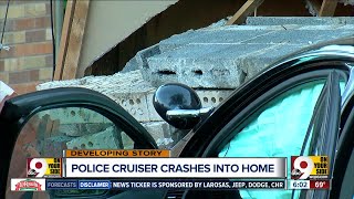 Police car crashes into College Hill home, narrowly misses resident