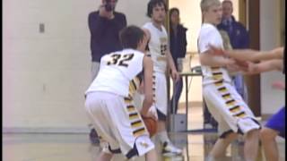 West Iron County's Tyler Stafford with Monster Block against Iron Mountain