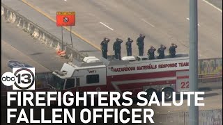 Firefighters salute procession for fallen HPD officer