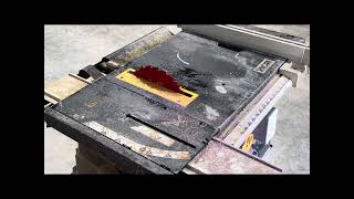 Cutting pink XPS foam insulation board 
